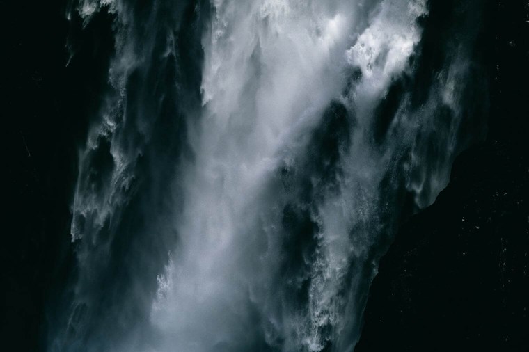 Dark and Dramatic Waterfall Image