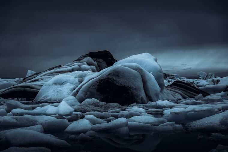 Glacier Lagoon with Ice in Dark Weather