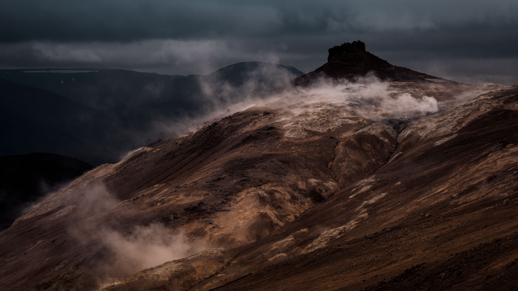 Dark Clouds over Námafjall mountain in Iceland (Myvatn)