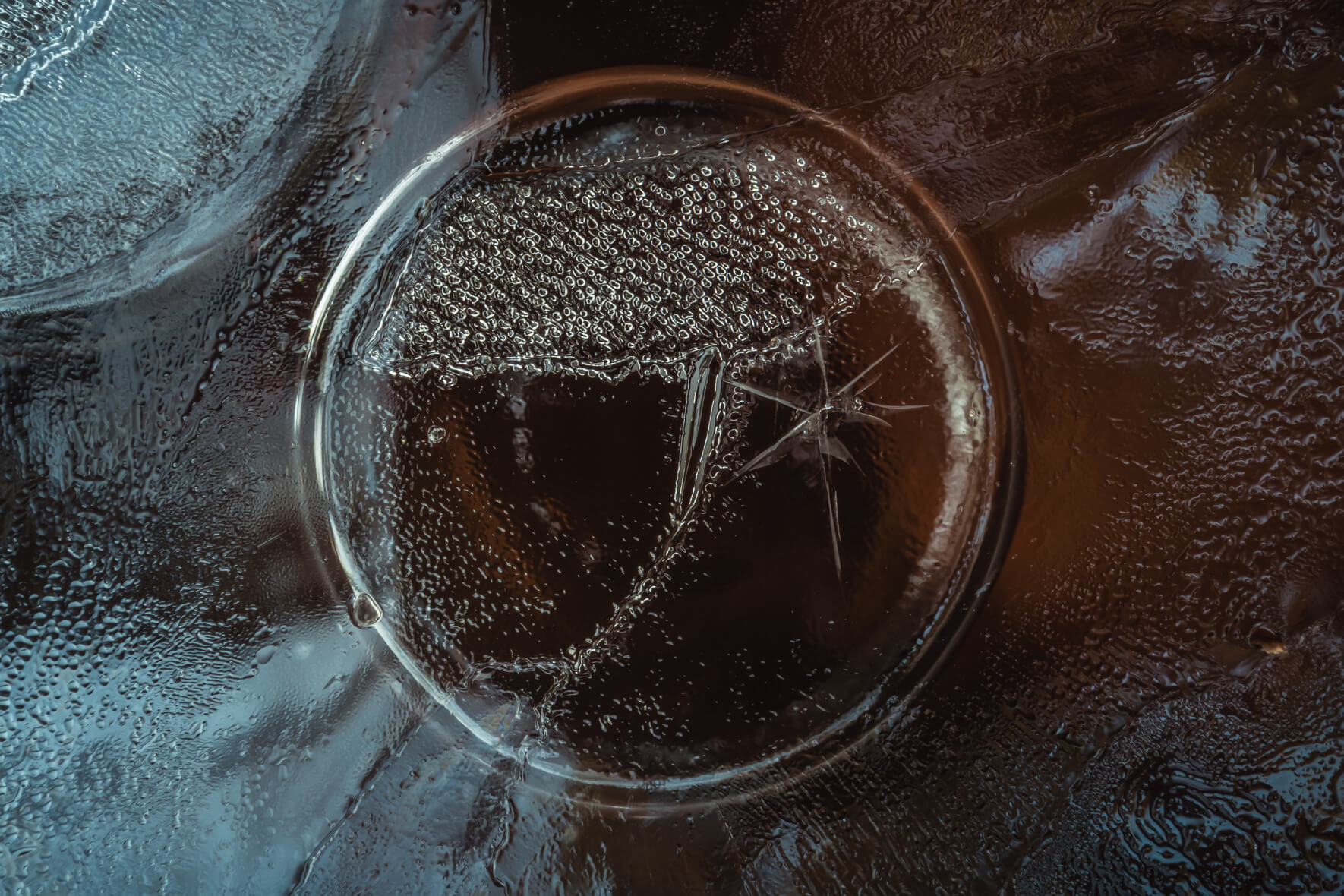 Winter Macro Photography of Frozen Air Bubble in Water
