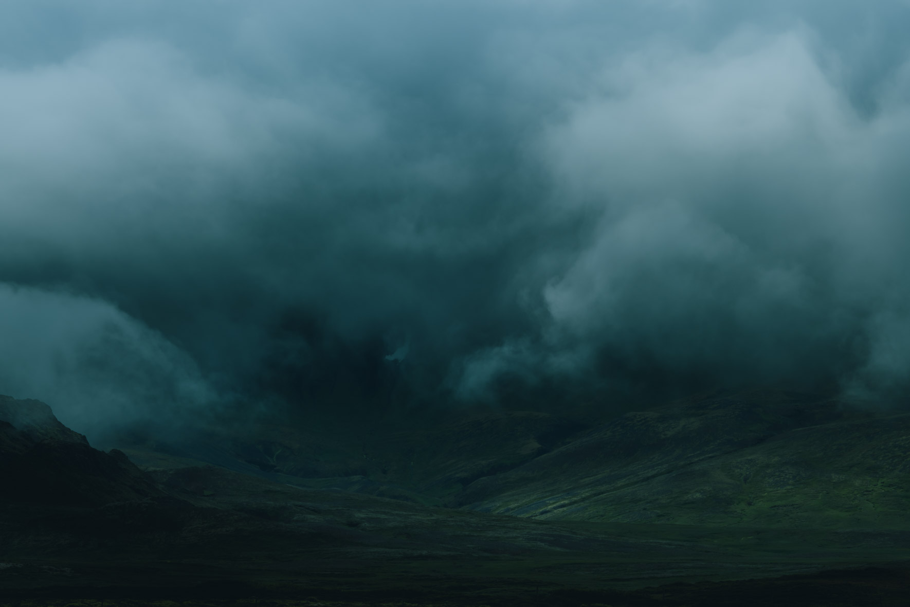 Dark and Moody Landscape in Iceland with Rain Clouds