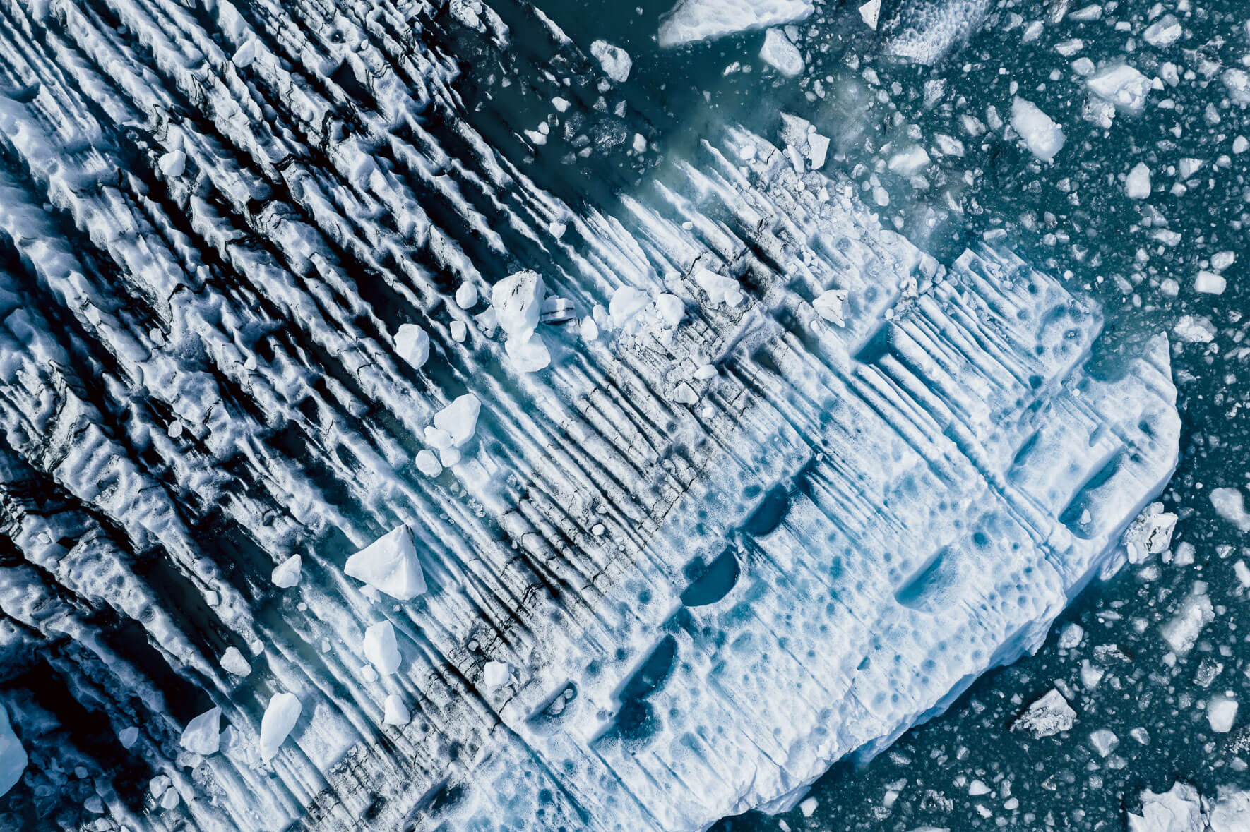 Aerial photograph of abstract icebergs in glacier lagoon in Iceland