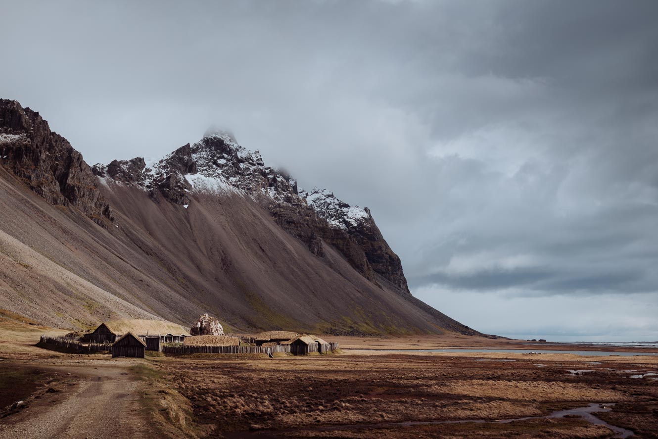 Abandoned viking village film set in Iceland with Vestrahorn mountain