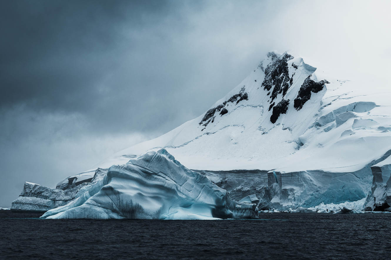 Snowy mountains and icebergs in the Gerlache Strait of Antarctica