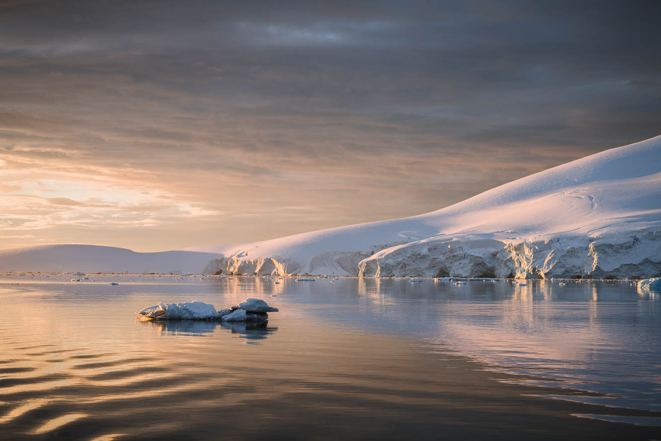 Beautiful Sunset over glacier landscape in Antarctica