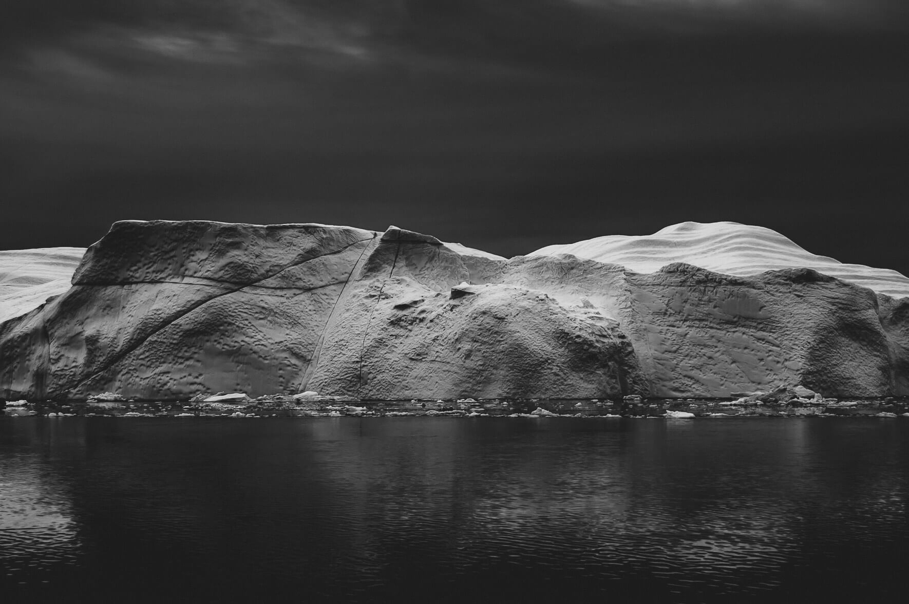 Massive iceberg in black and white (Disko Bay, Greenland)