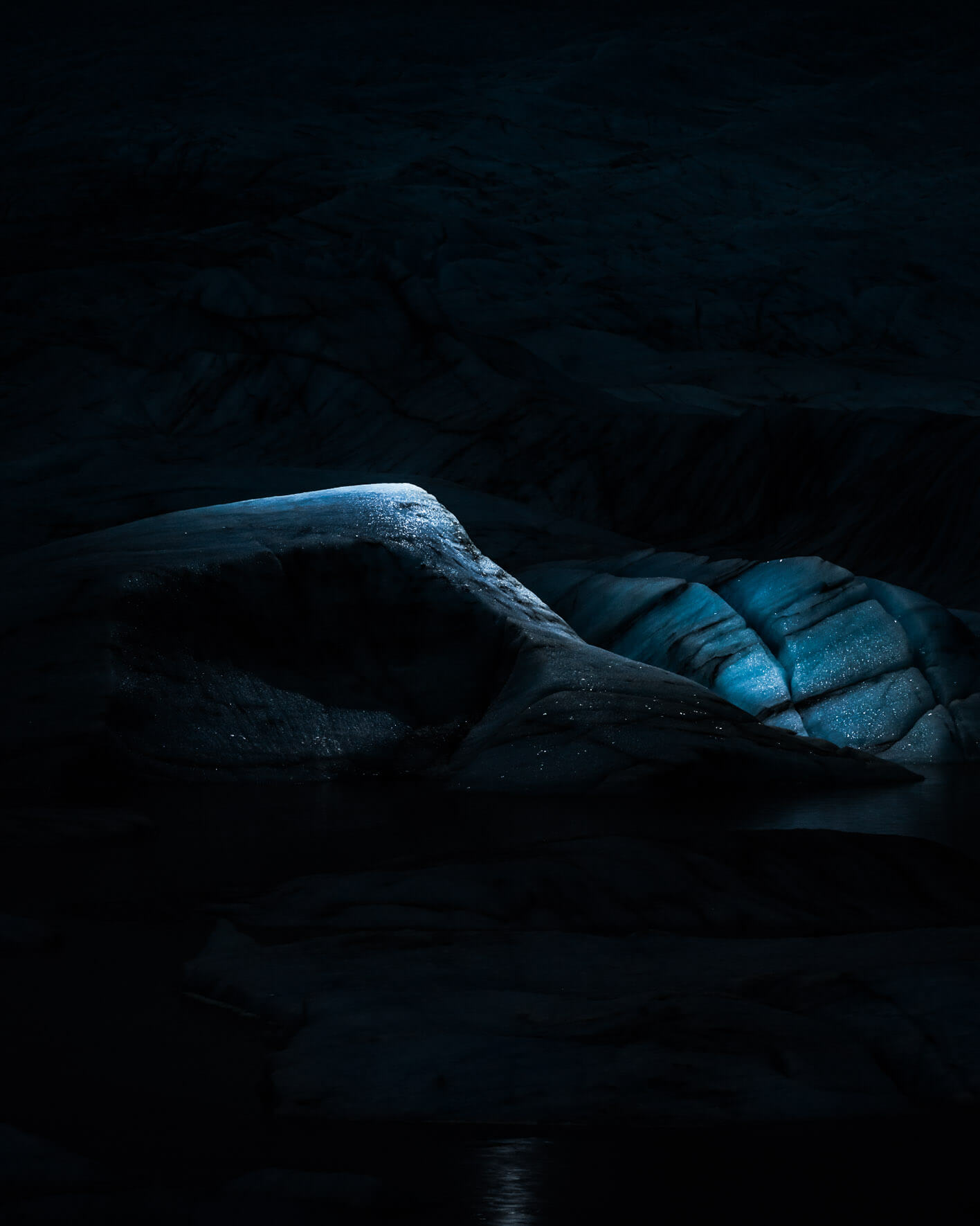 Glacier ice illuminated with aerial LED light (DJI Mavic 2 Pro)