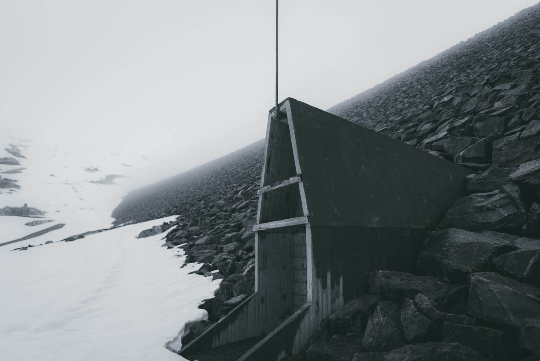 Dam architecture at the glacial lake Styggevatnet in Norway