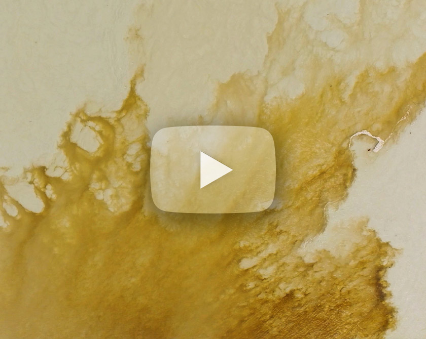 Abstract aerial video series of yellow and brown waterscapes